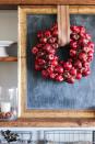 <p>Good for more than just pies, these vibrant apples make quite the statement on a wreath.</p><p><strong>Get the tutorial <a href="http://www.thewoodgraincottage.com/2014/09/17/diy-apple-wreath/" rel="nofollow noopener" target="_blank" data-ylk="slk:The Wood Grain Cottage;elm:context_link;itc:0;sec:content-canvas" class="link ">The Wood Grain Cottage</a>.</strong> </p>