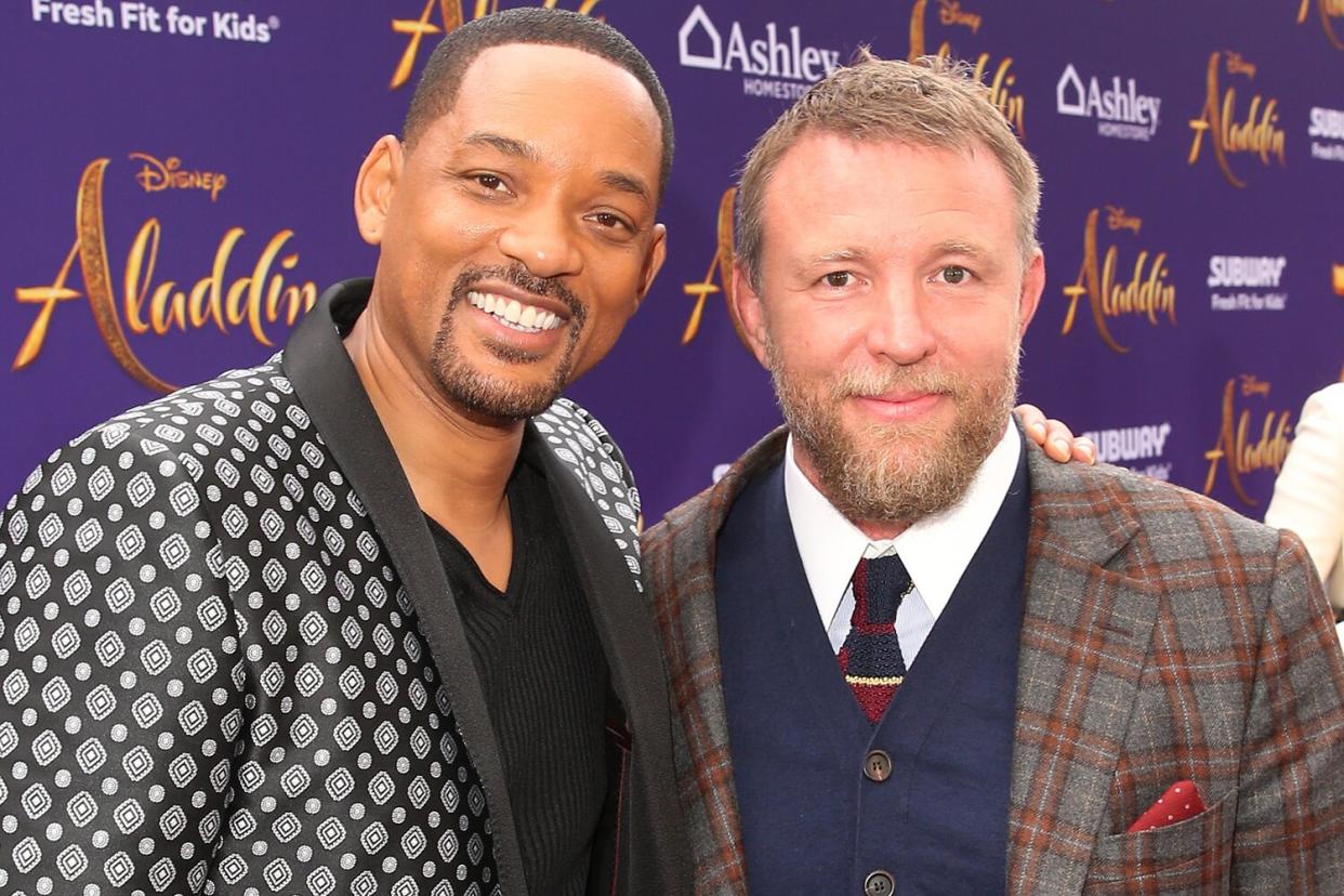 Will Smith (L) and Director Guy Ritchie attend the World Premiere of Disney’s "Aladdin" at the El Capitan Theater in Hollywood CA on May 21, 2019