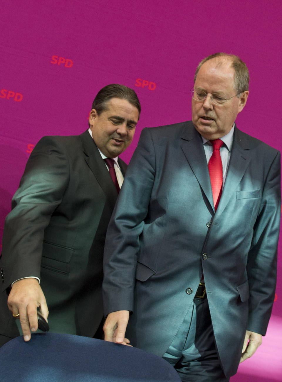 Angela Merkel's designated top challenger in the general elections Peer Steinbrueck, right, and head of the German Social Democrats, SPD, Sigmar Gabriel arrive for a meeting of the party's executive committee in Berlin, Germany, Monday, Oct. 1, 2012. (AP Photo/dapd, Michael Gottschalk)