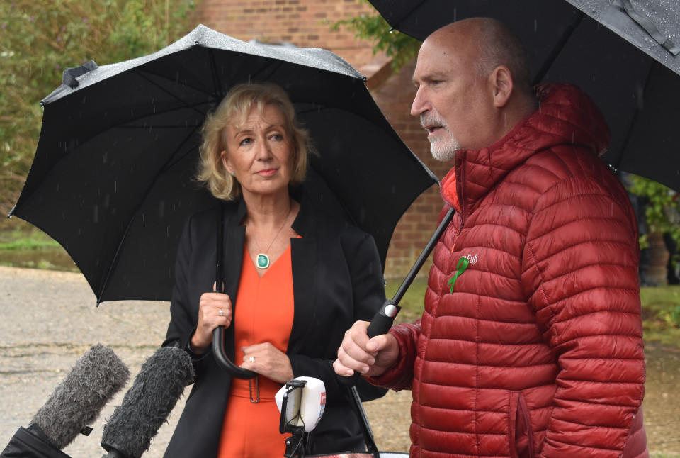 Andrea Leadsom MP and Harry Dunn family spokesman Radd Seiger arrive to speak to the media in Brackley, Northamptonshire, where the MP called on Donald Trump to personally intervene to ensure suspect Anne Sacoolas faces trial over teenager Harry Dunn's death a year ago.
