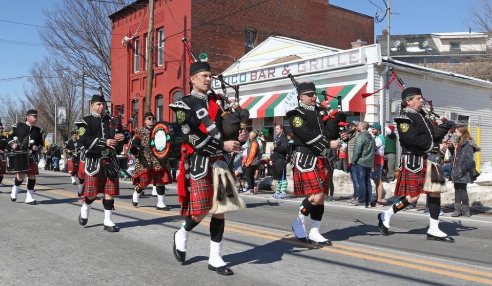 The Rhode Island Pipes and Drums, made up of firefighters, marches down Smith Street in the Providence St. Patrick's Day Parade in 2019. Last year's parade was canceled because of the pandemic and this year's was postponed until Sept. 18.