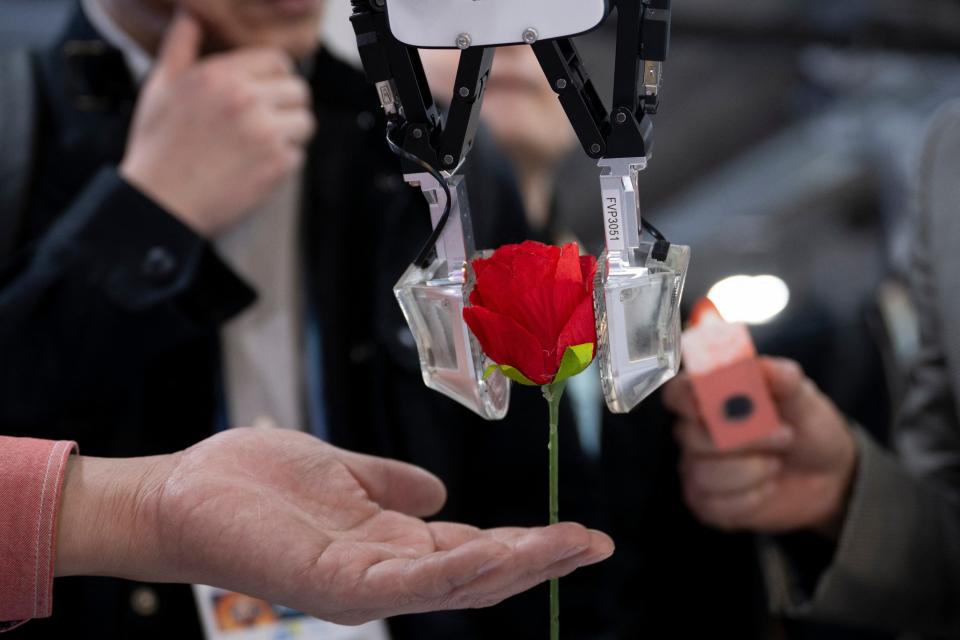 A smart hand from FingerVision Inc is seen moving a flower at the Eureka Park exhibition in the Venetian Expo Center during the Consumer Electronics Show (CES) on January 9, 2024 in Las Vegas, Nevada.