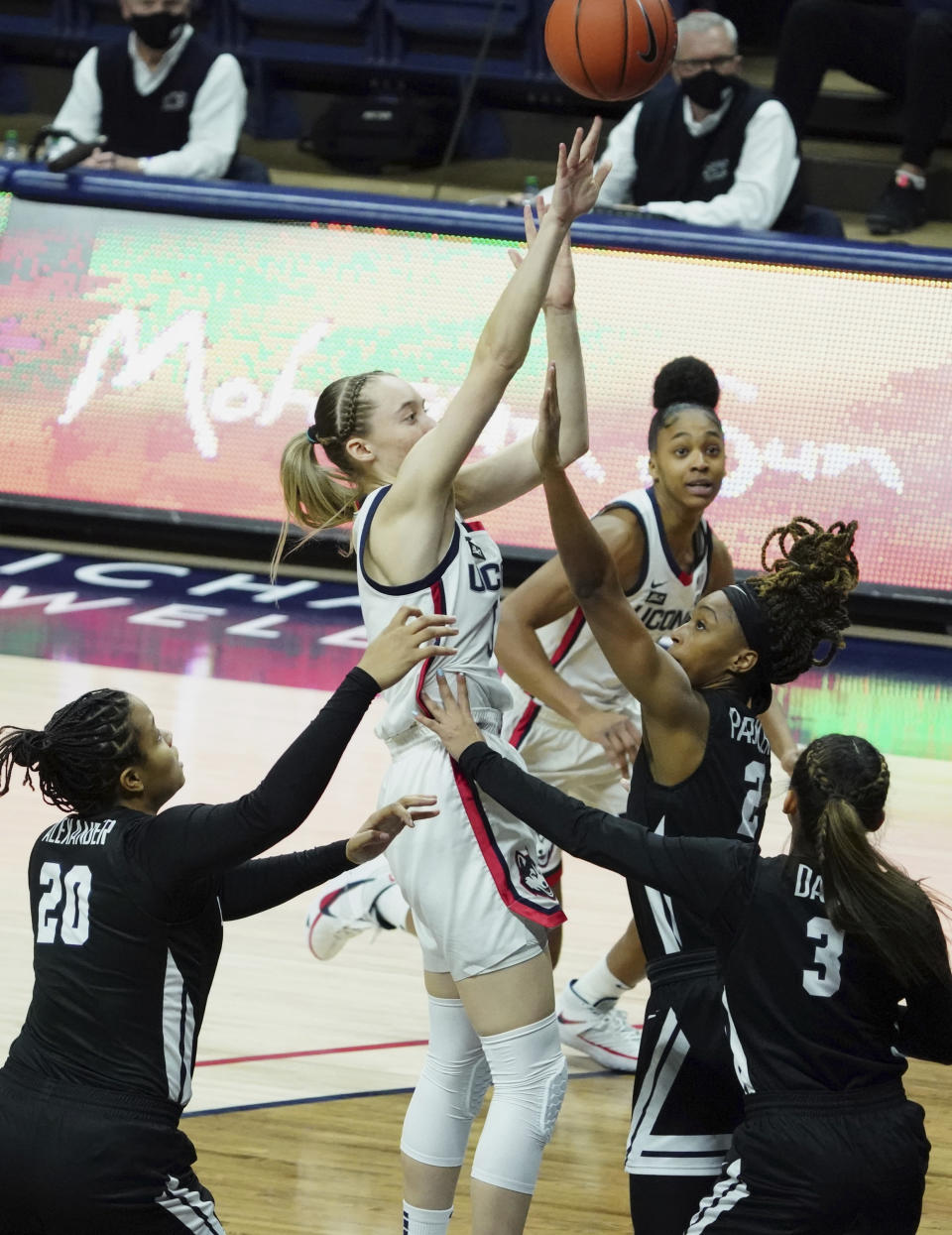 Connecticut guard Paige Bueckers (5) shoots against the Butler in the first half of an NCAA college basketball game Tuesday, Jan. 19, 2021, in Storrs, Conn. (David Butler II/Pool Photo via AP)