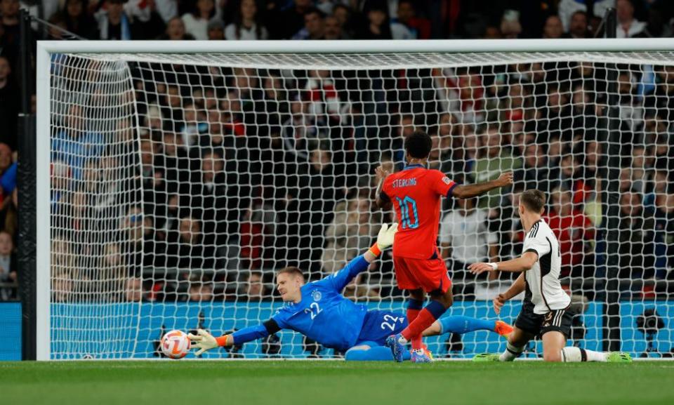 Raheem Sterling is denied by Marc-André ter Stegen.