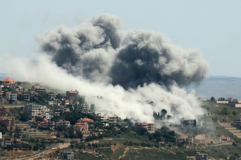 Smoke billows over the southern Lebanese village of Khiam after an Israeli strike (Rabih DAHER)