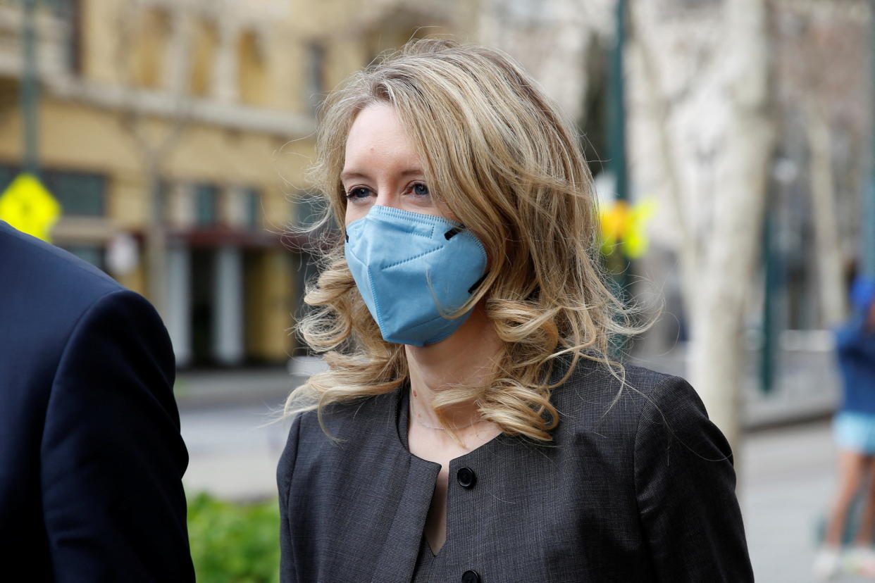 Theranos founder Elizabeth Holmes  and her family leave the federal courthouse after attending her fraud trial in San Jose, California, U.S. January 3, 2022.  REUTERS/Brittany Hosea-Small