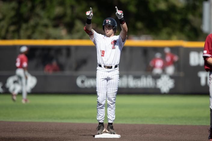 Texas Tech left fielder Easton Murrell celebrates a seventh-inning double in the Red Raiders' 10-2 victory Saturday at Dan Law Field/Rip Griffin Park. Murrell, a senior, reached base four times.