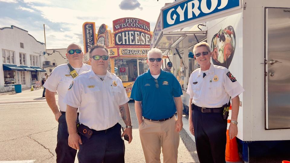 City Manager Al Minner by the Budweiser stage, catching up with local first responders on April 26, 2024 at Leesburg Bikefest 2024