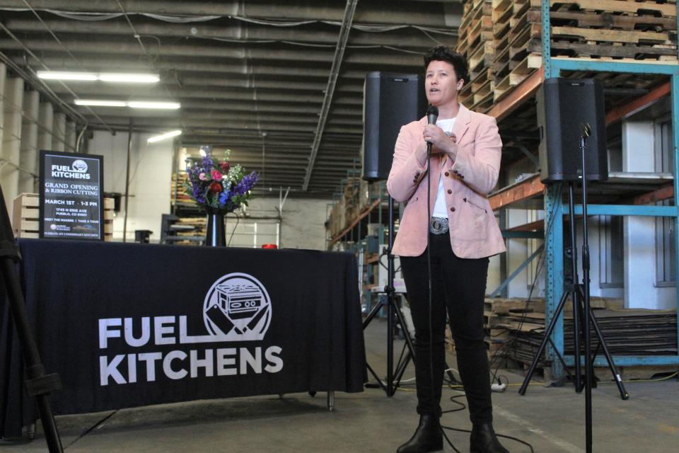 Jolene "JoJo" Collins speaks to attendees during the grand opening ceremony of Fuel Kitchens on Friday, March 1, 2024.