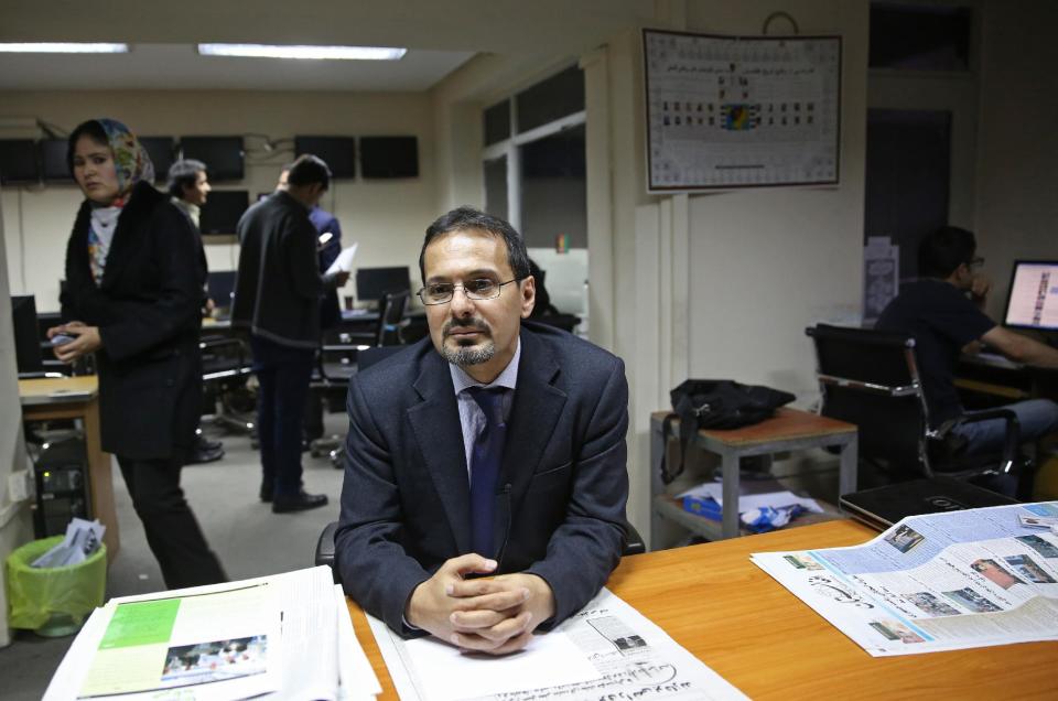 In this Monday, Feb. 3, 2014 photo, Mujahid Kakar, Tolo anchor and mediator of the upcoming debate listens during an interview at his office in Kabul, Afghanistan. The proliferation of Afghan media in the past 12 years is one of the most visible bright spots of the fraught project to foster a stable democracy. (AP Photo/Massoud Hossaini)