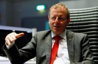 Jan Woerner, Director General of the European Space Agency (ESA) gestures during an exclusive Reuters interview in the main control room of the European Space Operations Centre (ESOC) in Darmstadt, Germany June 17, 2016. REUTERS/Ralph Orlowski