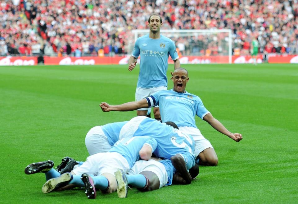 Manchester City players celebrate Yaya Toure’s goal (The FA via Getty Images)