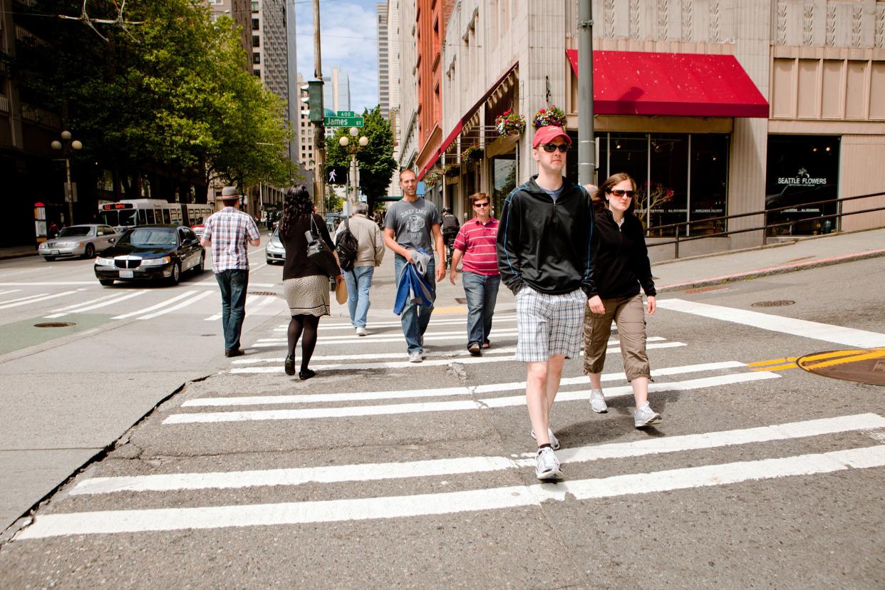 people walking along the streets of downtown Seattle