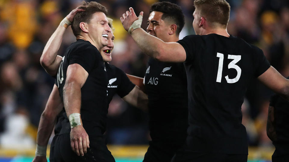 Beauden Barrett of the All Blacks celebrates with teammates after scoring a try. (Photo by Matt King/Getty Images)