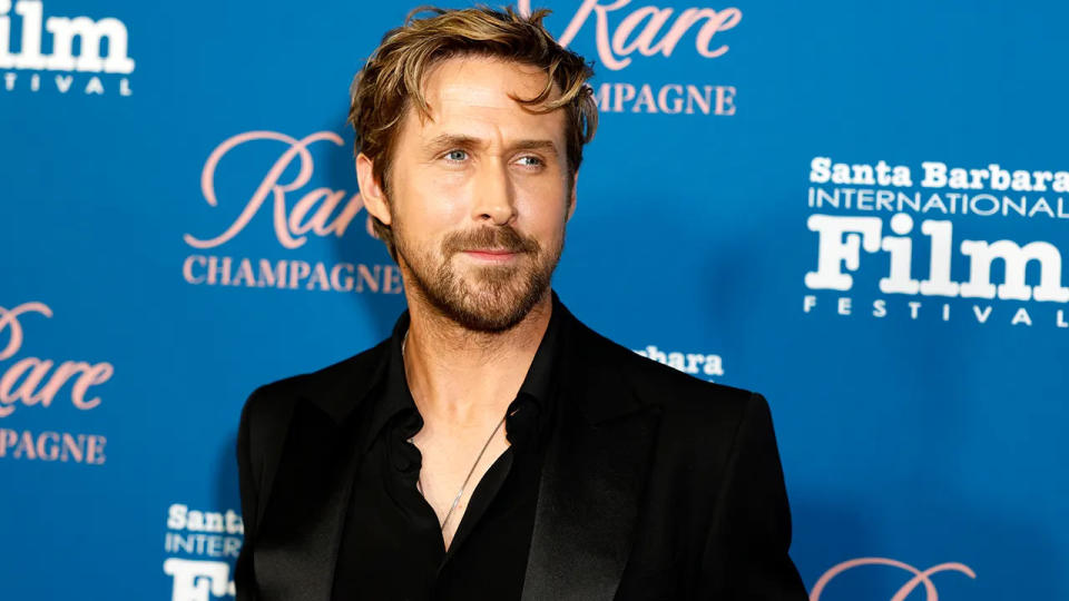 Ryan Gosling at the Santa Barbara Film Festival wearing a black suit.