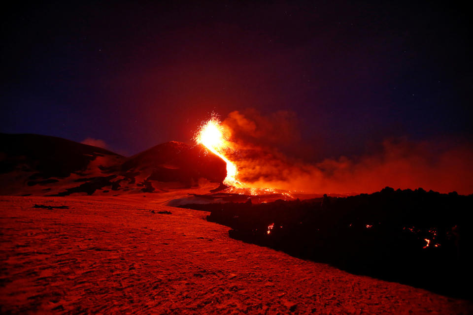 <p>Mount Etna, Europe’s most active volcano, spews lava during an eruption, near the Sicilian town of Catania, southern Italy, Tuesday, Feb. 28, 2017. (Antonio Parrinello/Reuters) </p>