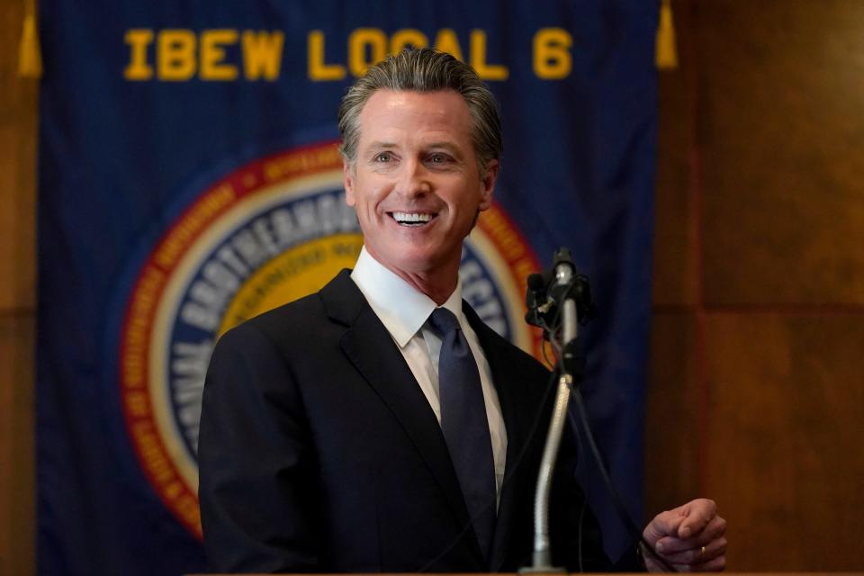 California Gov. Gavin Newsom speaks to volunteers in San Francisco.