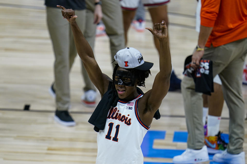 Illinois guard Ayo Dosunmu (11) celebrates after defeating Ohio State to win the Big Ten title. (AP Photo/Michael Conroy)