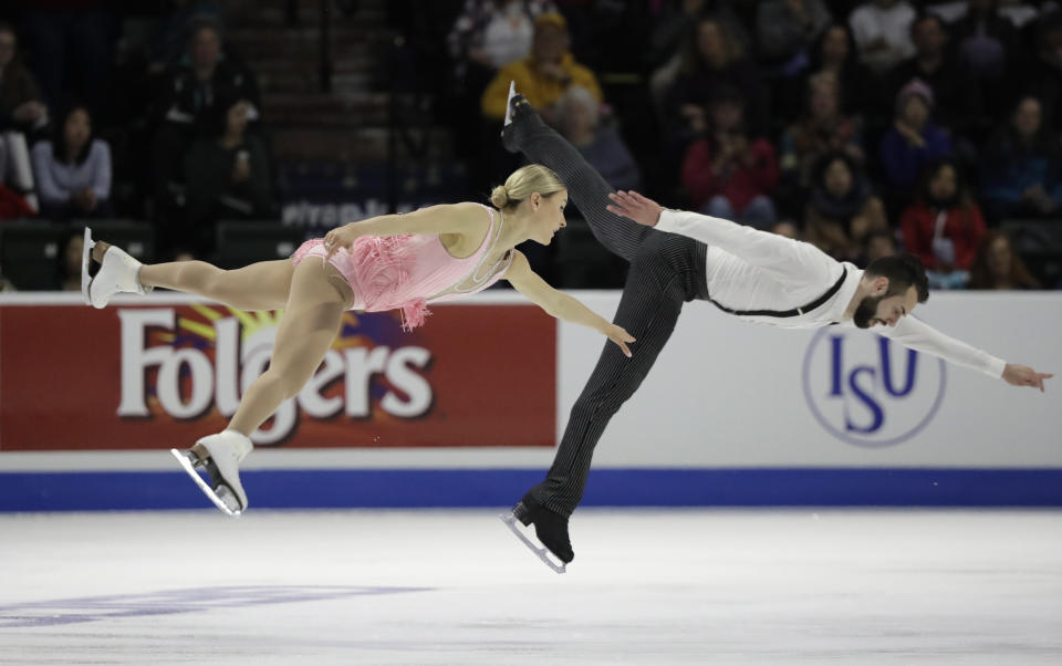 Ashley Cain and Timothy Leduc perform during the pairs short program at Skate America, Friday, Oct. 19, 2018, in Everett, Wash. (AP Photo/Ted S. Warren)