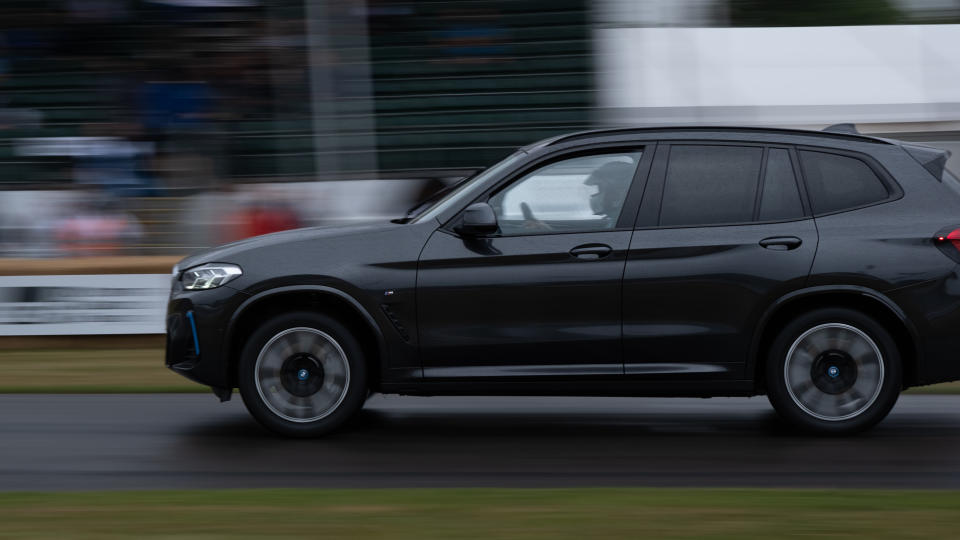 A car racing on as track at Goodwood