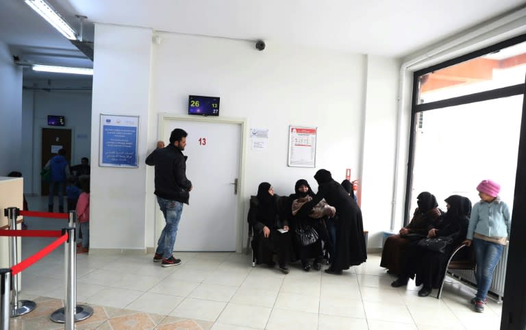 Syrian doctors and nurses, who have fled the conflict in their homeland, undergo seven weeks of training in Turkey before being authorised to resume their careers and work in a migrant health centre