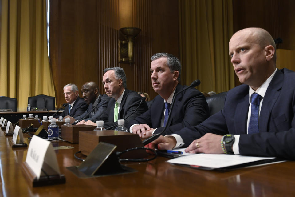 Prime Therapeutics Senior Vice President, General Counsel, and Interim President and Chief Executive Officer Mike Kolar, right, testifies before the Senate Finance Committee on Capitol Hill in Washington, Tuesday, April 9, 2019, during a hearing to explore the high cost of prescription drugs. He is joined at the table by, from left, Cigna Corporation Executive Vice President and Chief Clinical Officer Steve Miller, CVS Caremark President and CVS Health Executive Vice President Derica Rice, Humana Healthcare Services Segment President William Fleming and OptumRx Chief Executive Officer John Prince. (AP Photo/Susan Walsh)