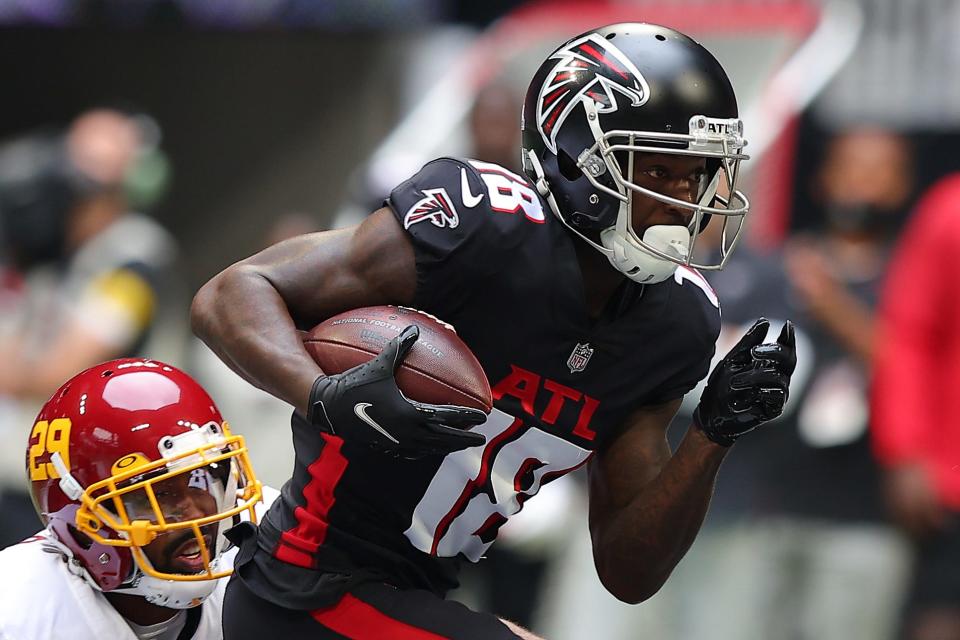 Atlanta Falcons' Calvin Ridley runs with the ball after a catch during a game in October 2021.