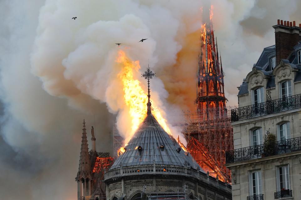 Smoke and flames rise during a fire at the landmark Notre-Dame Cathedral in central Paris on April 15, 2019, potentially involving renovation works being carried out at the site, the fire service said. (Photo: Pierre Galey/AFP/Getty Images)