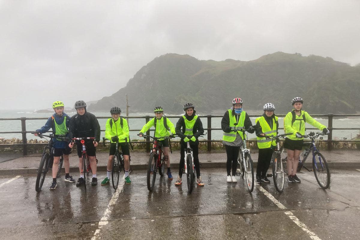 Eight students and four staff from The Wellington Academy took part in  a 102-mile charity bike ride in Devon. <i>(Image: Supplied)</i>