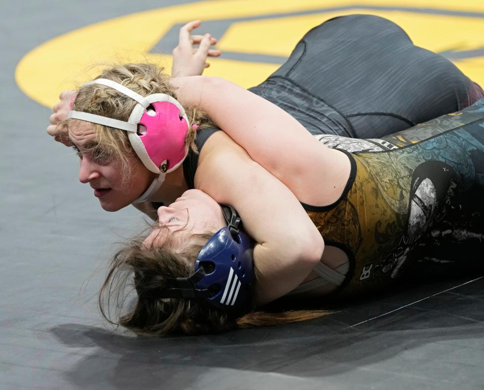 Marysville's Cali Leng, the daughter of Highland two-time state champion Jesse Leng of Highland, needs one win to become an All-American at the girls Junior Freestyle National Championships in Fargo, N.D.