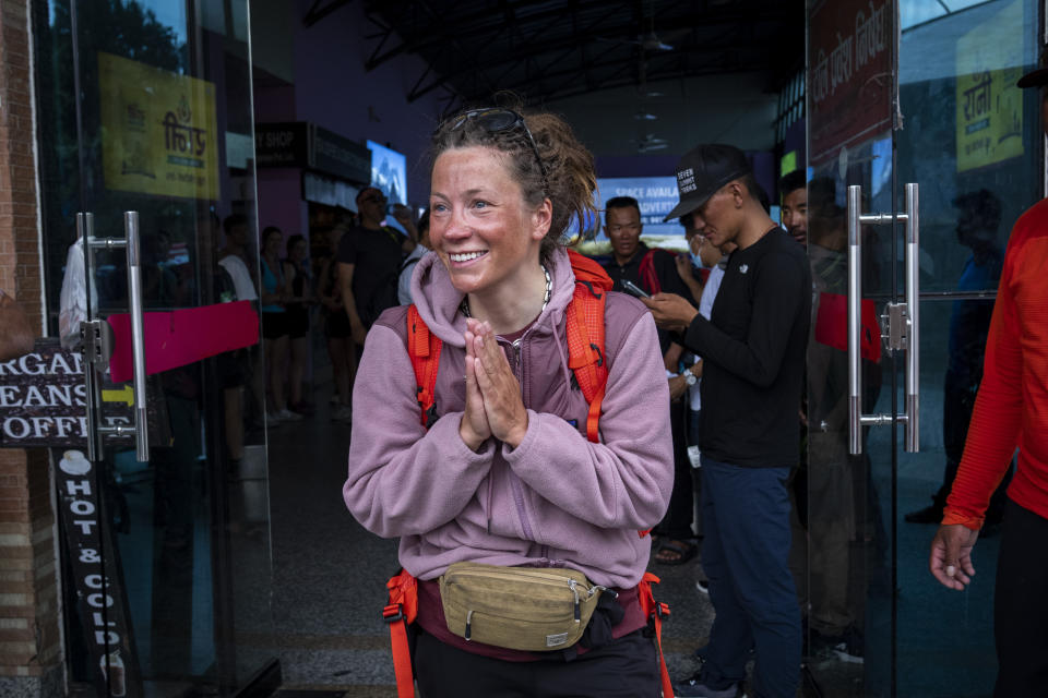 Norwegian climber Kristin Harila, 37, arrives after summiting Annapurna in Kathmandu, Nepal, Tuesday, June 6, 2023. The Norwegian who is aiming to be the fastest climber to scale all the world's 14 highest mountains announced she is shortening her goal and do it in half the time than initial target. (AP Photo/Niranjan Shrestha)