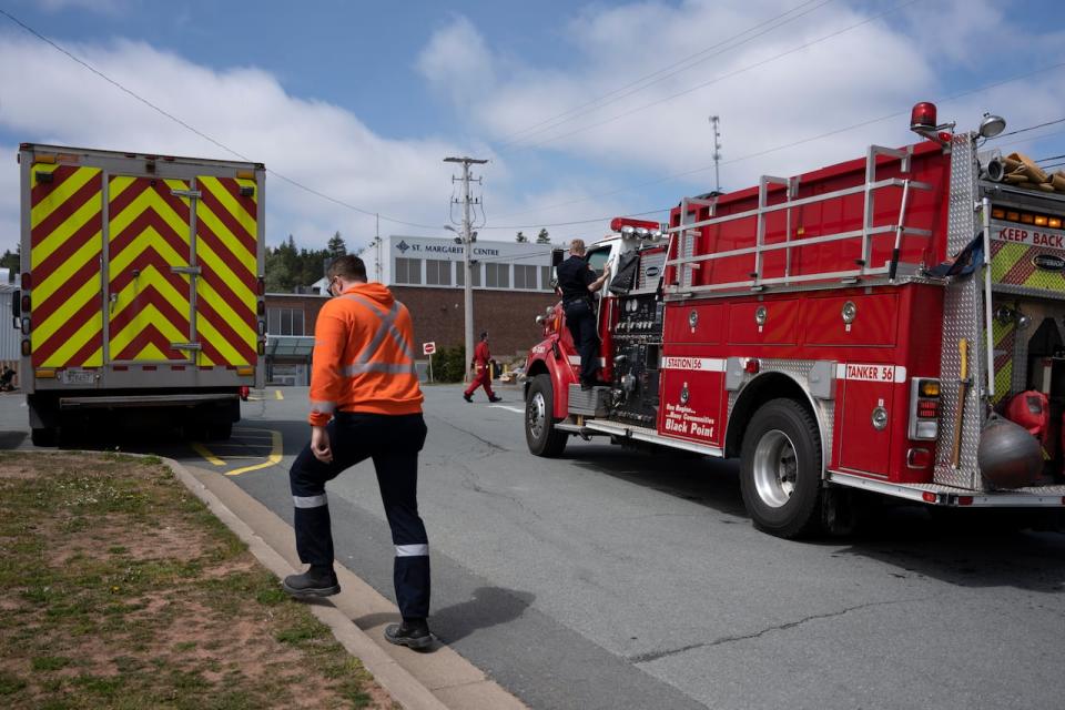 Firefighters and other emergency responders work at a staged command centre outside of Halifax. Climate change may lead to longer and more intense fire seasons in the region. 