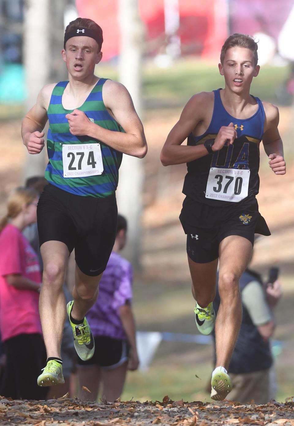 Oakfield-Alabama junior Connor Domoy, right, won the Class D title, and Drew Reigelsperger of Bloomfield/Naples placed third at the Section V Cross Country Championships at Letchworth State Park on Nov. 5, 2022.
