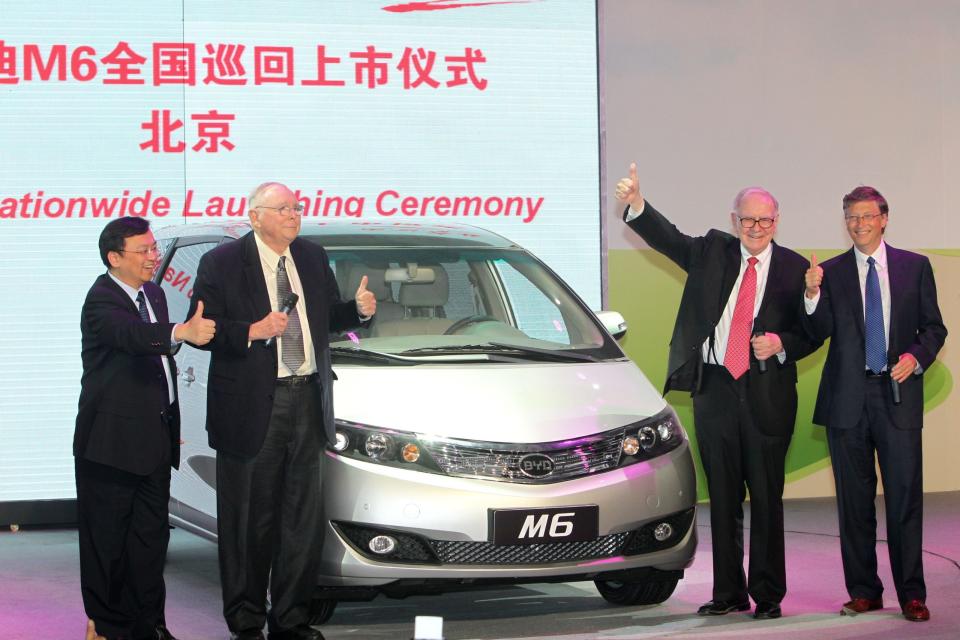 Wang Chuanfu (L), the Chairman and President of BYD, Berkshire Hathaway CEO Warren E. Buffett (2nd-R), Vice-Chairman Charles Thomas Munger (2nd-R) and Bill Gates (R), founder of Microsoft Inc., attend a new product launching conference of BYD at China World Hotel on September 29, 2010 in Beijing, China. Warren E. Buffett and Bill Gates are in China to meet the wealthiest of the country to encourage philanthropy.