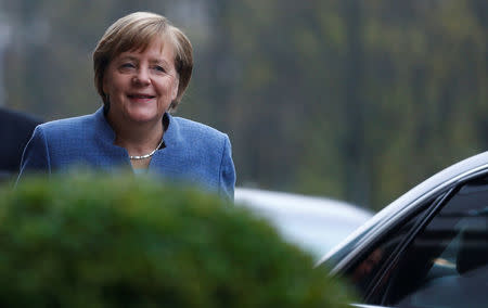 Angela Merkel, leader of the Christian Democratic Union (CDU), arrives at the German Parliamentary Society for exploratory talks about forming a new coalition government in Berlin, Germany, November 15, 2017. REUTERS/Hannibal Hanschke