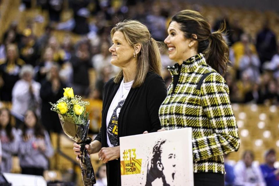 Missouri head coach Robin Pingeton (left) and director of athletics Desiree Reed-Francois await senior day introductions on Feb. 26, 2023, in Columbia, Mo.