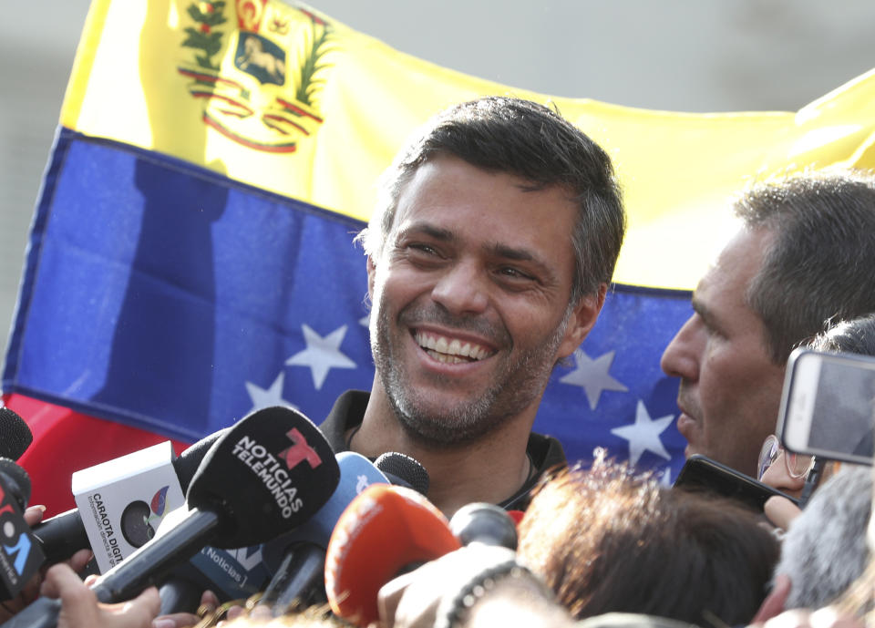 Venezuelan opposition leader Leopoldo Lopez smiles during a press conference at the gate of the Spanish ambassador's residence in Caracas, Venezuela, Thursday, May 2, 2019. López said he expects that the country's military will step up to overthrow President Nicolas Maduro despite setbacks. (AP Photo/Martin Mejia)