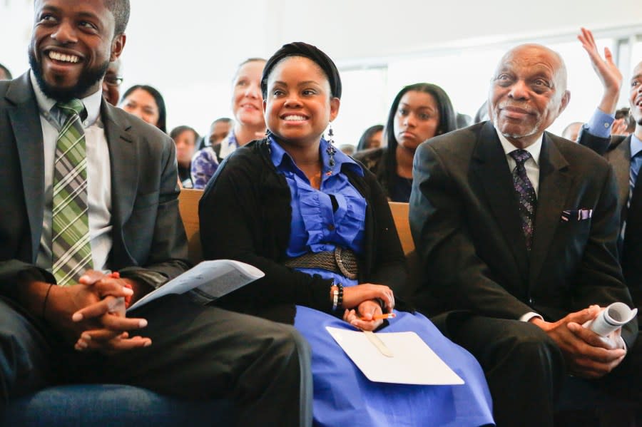 AIDS advocate Hydeia Broadbent, middle, during AIDS Healthcare Foundation’s third community forum in a nationwide series on “AIDS is a Civil Rights Issue” at Holman United Methodist Church, Sunday, Feb. 23, 2014, in Los Angeles. The forum series highlights the continued disproportionate impact of hIV/AIDS on African-American and Latino communities in the US, and included events in Mississippi, Texas, California and Louisiana. (Bret Hartman/AP Images for AIDS Healthcare Foundation)