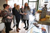 <p>After spending the morning in Northern Ireland, Kate made a quick outfit change before arriving in Aberdeen, Scotland. The Duchess swapped her outdoorsy olive coat for a sleek wool one, and traded in her farm-ready boots for a chic pair of ankle booties.</p>