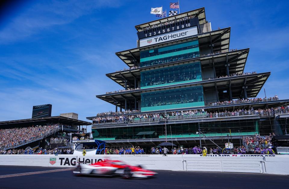 Chip Ganassi Racing driver Marcus Ericsson (8) crosses the finish line to win the 106th running of the Indianapolis 500 on Saturday, May 28, 2022, at Indianapolis Motor Speedway. 