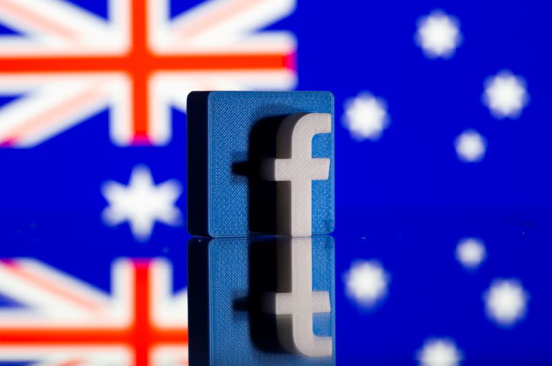 FILE PHOTO: A 3D-printed Facebook logo is seen in front of a displayed Australian flag in this illustration photo