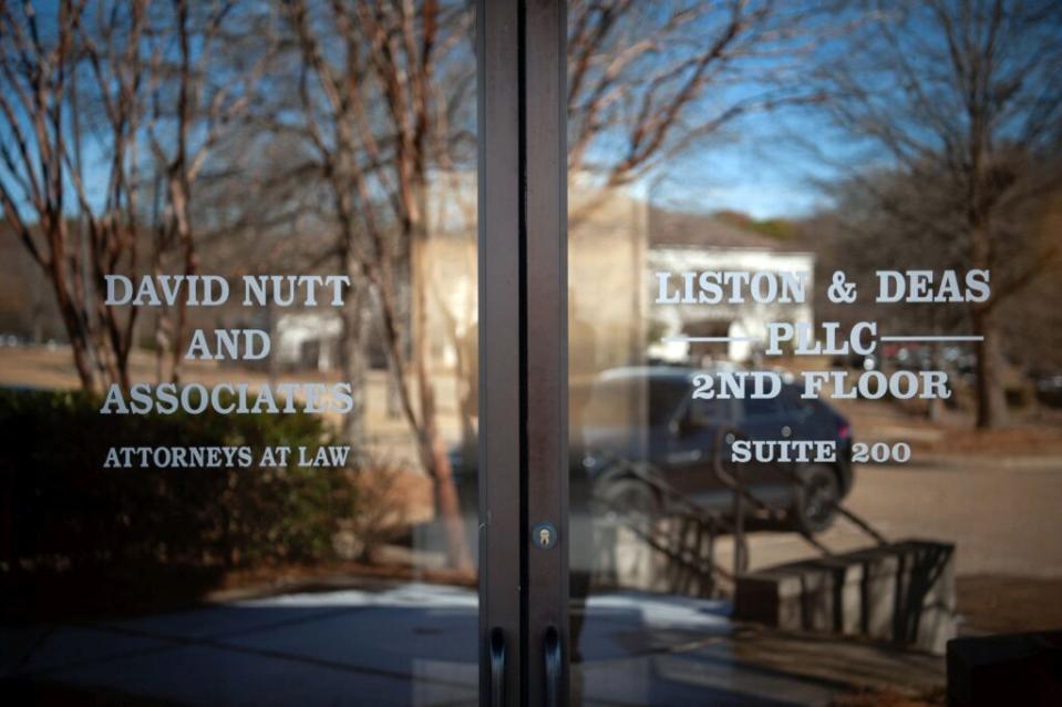 A law office with etchings on the doors