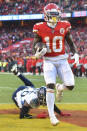 Kansas City Chiefs' Tyreek Hill scores a touchdown in front of Tennessee Titans' Logan Ryan during the first half of the NFL AFC Championship football game Sunday, Jan. 19, 2020, in Kansas City, MO. (AP Photo/Ed Zurga)