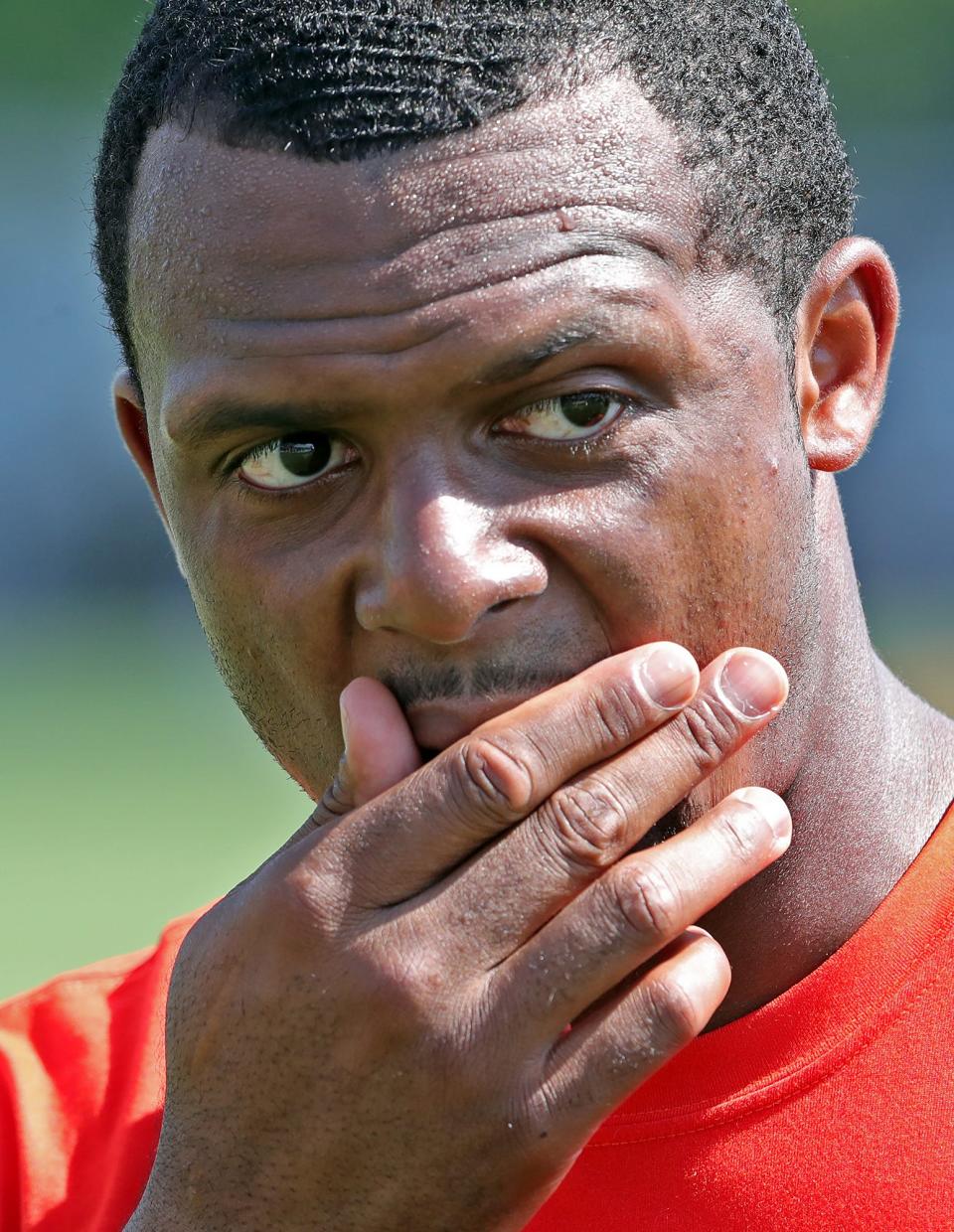 Cleveland Browns quarterback Deshaun Watson comes off the field after the NFL football team's football training camp in Berea on Wednesday.