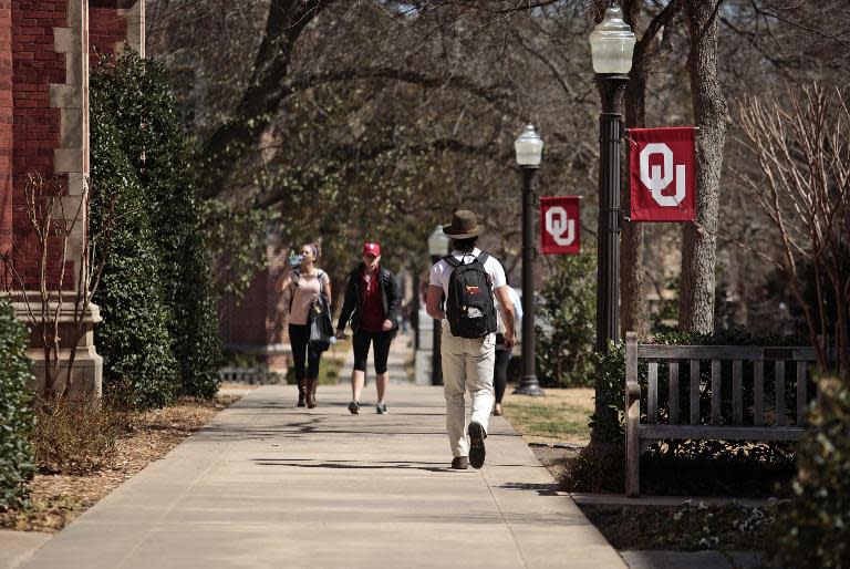Students walk on the University of Oklahoma campus on March 11, 2015 in Norman, Oklahoma