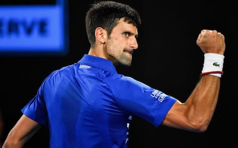 Serbia's Novak Djokovic reacts after a point against Spain's Rafael Nadal during the men's singles final on day 14 of the Australian Open tennis tournament in Melbourne on January 27, 2019. - Credit: AFP