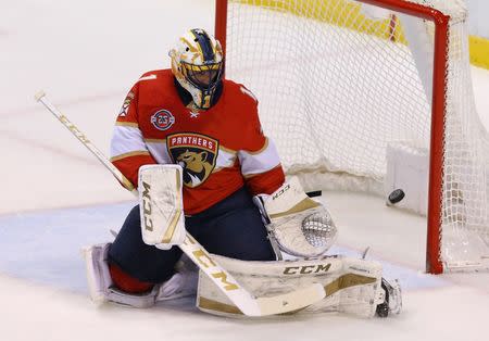 Apr 1, 2019; Sunrise, FL, USA; Florida Panthers goaltender Roberto Luongo (1) makes a save in the first period against the Washington Capitals at BB&T Center. Mandatory Credit: Robert Mayer-USA TODAY Sports