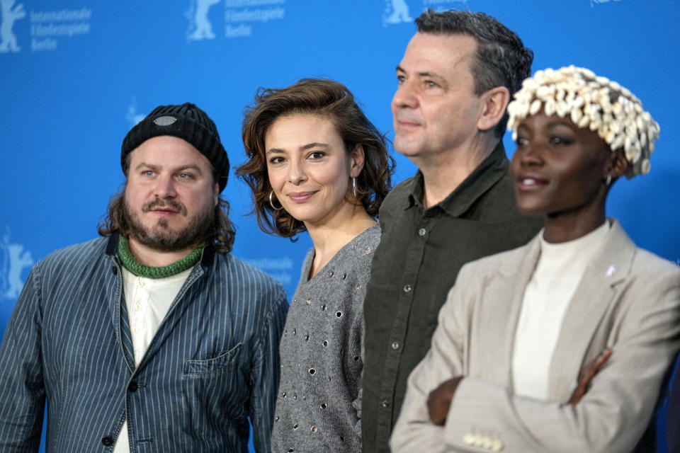 The Film Festival, Berlinale International Jury from left, Brady Corbet, Jasmine Trinca, Christian Petzold, Lupita Nyong'o and Albert Serra pose for media during a photo-call at the opening day of International Film Festival, Berlinale, in Berlin, Thursday, Feb. 15, 2024. The 74th edition of the festival will run until Sunday, Feb. 25, 2024 at the German capital. (AP Photo/Ebrahim Noroozi)