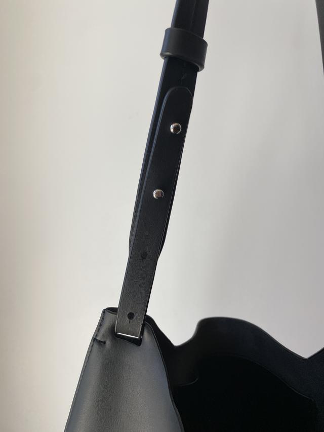 close up of black bag, The Cactus Leather Hobo bag's adjustable strap 