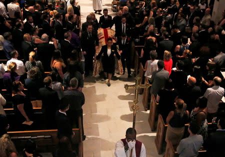 The casket of Christopher Leinonen, who was killed at the Pulse gay nightclub, leaves Cathedral Church of St. Luke after a funeral service in Orlando, Florida, June 18, 2016. REUTERS/Jim Young